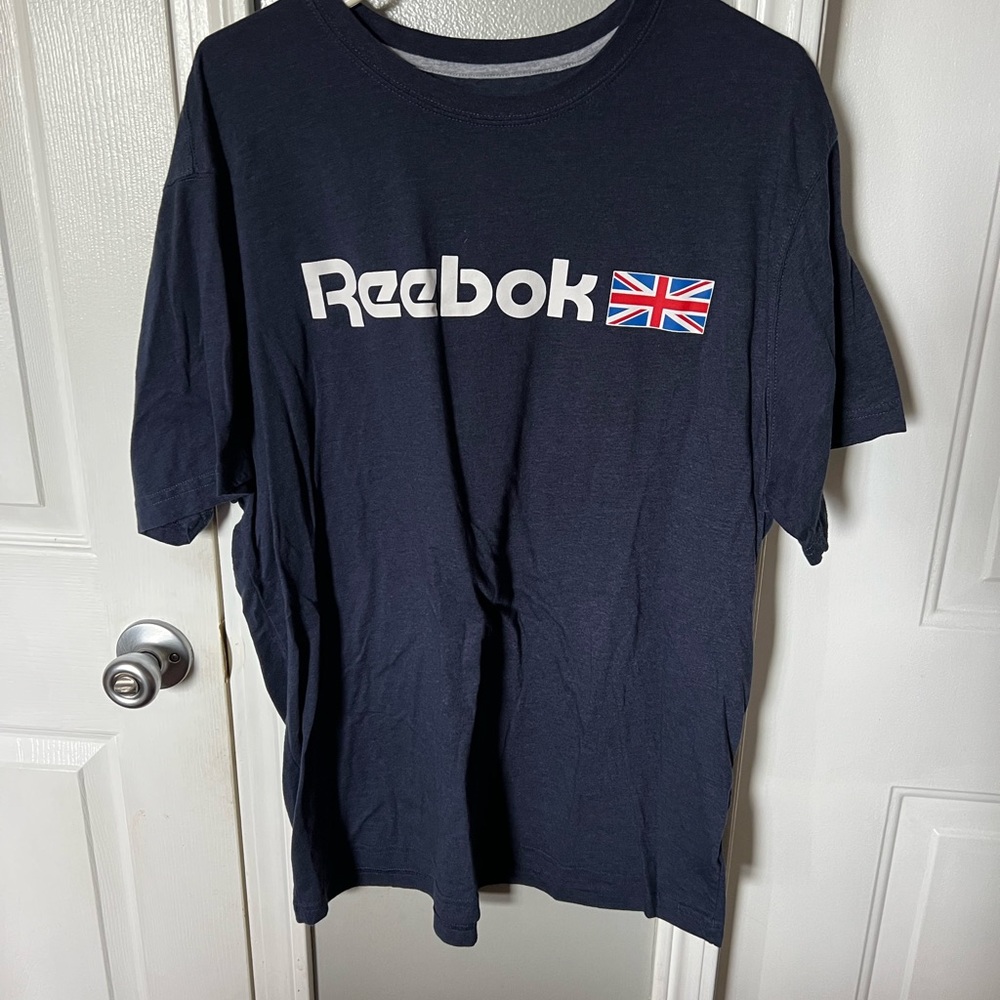 Size XL throwback Reebok logo shirt. Work but still life.